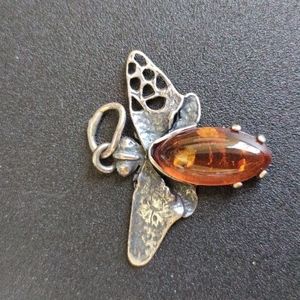 Amber and silver necklace. Small bug Amber and silver piece.